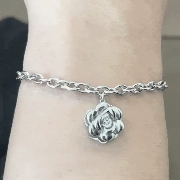 PULSERA DE ACERO PARA MUJER ROSA GIRATORIA - Imagen 2