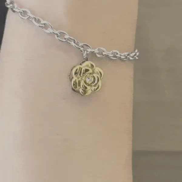 PULSERA DE ACERO CHAPADA EN ORO ROSA PARA MUJER ROSA GIRATORIA - Imagen 2